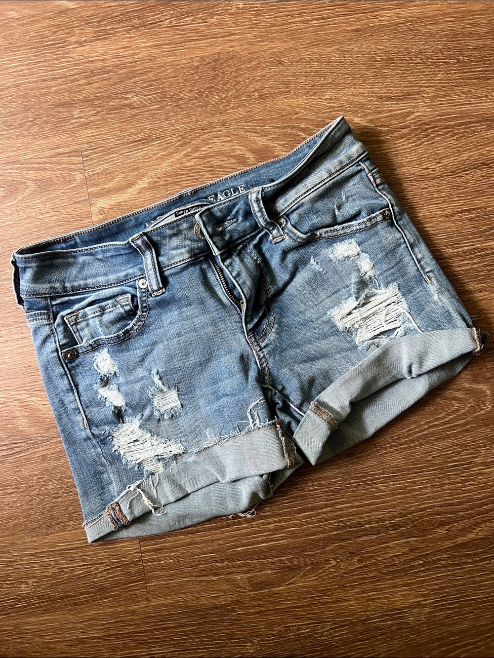 American Eagle Outfitters Distressed Light Blue Rolled-Hem Jean Shorts